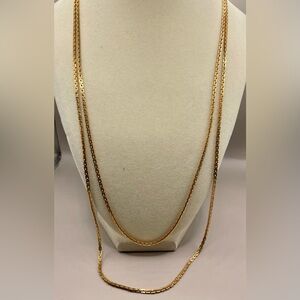Sarah Coventry gold tone double layer necklace. Double closure. 26 inches long.